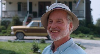 Movie still from “What About Bob?” (1991), directed by Frank Oz – An older man wearing a hat in front of a house; Close Up shot, Low angle