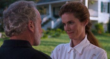 Movie still from “What About Bob?” (1991), directed by Frank Oz – An older man and a younger woman talking in a yard; Close Up shot, Over the shoulder angle