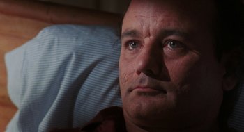 Movie still from “What About Bob?” (1991), directed by Frank Oz – A man's face as he lies in bed; Close Up shot, Low angle