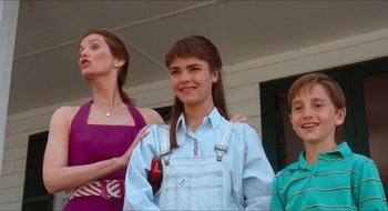 Movie still from “What About Bob?” (1991), directed by Frank Oz – A group of young people standing next to each other; Medium shot, Low angle