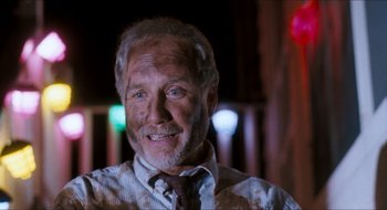 Movie still from “What About Bob?” (1991), directed by Frank Oz – An older man wearing a shirt and a tie; Close Up shot, Low angle