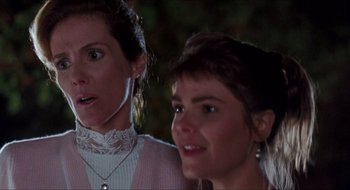 Movie still from “What About Bob?” (1991), directed by Frank Oz – Two young women standing next to each other; Close Up shot, Over the shoulder angle