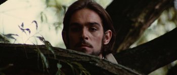Movie still from “What Have You Done to Solange?” (1972), directed by Massimo Dallamano – A person with long hair and a beard; Close Up shot, Low angle