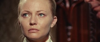 Movie still from “What Have You Done to Solange?” (1972), directed by Massimo Dallamano – A person with blue eyes; Close Up shot, Low angle