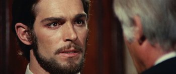 Movie still from “What Have You Done to Solange?” (1972), directed by Massimo Dallamano – A person with a beard; Close Up shot, Over the shoulder angle