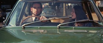 Movie still from “What Have You Done to Solange?” (1972), directed by Massimo Dallamano – A man and a woman in the back seat of a car; Medium shot, Over the shoulder angle