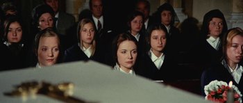 Movie still from “What Have You Done to Solange?” (1972), directed by Massimo Dallamano – A group of young people in suits and ties; Medium shot, High angle