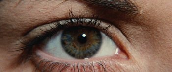 Movie still from “What Have You Done to Solange?” (1972), directed by Massimo Dallamano – A person's eye with the reflection of the sky in it; Extreme Close Up shot, Overhead angle