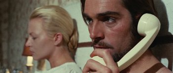 Movie still from “What Have You Done to Solange?” (1972), directed by Massimo Dallamano – A man and a woman looking at each other; Close Up shot, Low angle