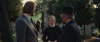Movie still from “What Have You Done to Solange?” (1972), directed by Massimo Dallamano – Two men and a woman talking to each other outside; Medium shot, Over the shoulder angle