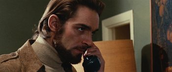 Movie still from “What Have You Done to Solange?” (1972), directed by Massimo Dallamano – A person talking on a phone; Close Up shot, Low angle