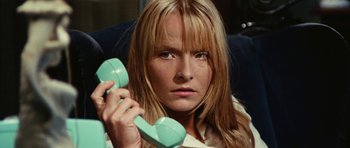 Movie still from “What Have You Done to Solange?” (1972), directed by Massimo Dallamano – A woman holding a phone up to her ear; Close Up shot, Low angle