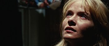 Movie still from “What Have You Done to Solange?” (1972), directed by Massimo Dallamano – A woman's face looking upward; Close Up shot, Low angle