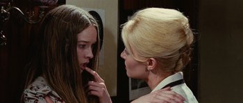 Movie still from “What Have You Done to Solange?” (1972), directed by Massimo Dallamano – A woman and a young girl looking at each other; Close Up shot, Over the shoulder angle