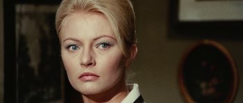 Movie still from “What Have You Done to Solange?” (1972), directed by Massimo Dallamano – A person with blue eyes; Close Up shot, Low angle