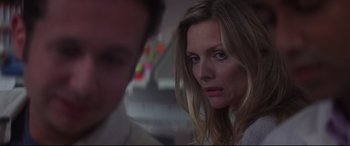 Movie still from “What Lies Beneath” (2000), directed by Robert Zemeckis – A person looking at the camera; Close Up shot, Over the shoulder angle