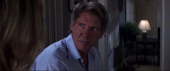 Movie still from “What Lies Beneath” (2000), directed by Robert Zemeckis – A person wearing a shirt; Close Up shot, Over the shoulder angle