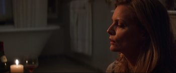 Movie still from “What Lies Beneath” (2000), directed by Robert Zemeckis – A person with her eyes closed; Close Up shot, Over the shoulder angle