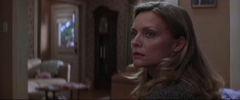 Movie still from “What Lies Beneath” (2000), directed by Robert Zemeckis – A person with long hair; Close Up shot, Low angle