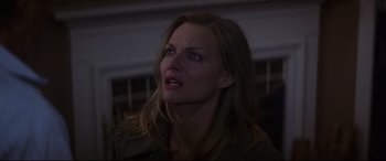 Movie still from “What Lies Beneath” (2000), directed by Robert Zemeckis – A person with long brown hair; Close Up shot, Low angle