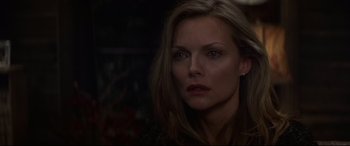 Movie still from “What Lies Beneath” (2000), directed by Robert Zemeckis – A person with long blonde hair; Close Up shot, Over the shoulder angle