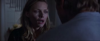 Movie still from “What Lies Beneath” (2000), directed by Robert Zemeckis – A person talking to another person; Close Up shot, Over the shoulder angle