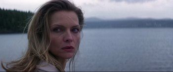 Movie still from “What Lies Beneath” (2000), directed by Robert Zemeckis – A person near a body of water; Close Up shot, Low angle