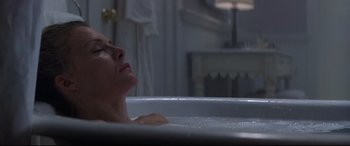 Movie still from “What Lies Beneath” (2000), directed by Robert Zemeckis – A woman is taking a bath in a bathtub; Close Up shot, High angle
