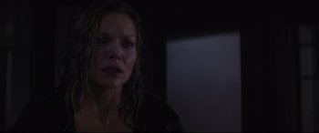 Movie still from “What Lies Beneath” (2000), directed by Robert Zemeckis – A person with wet hair looking sad; Close Up shot, Low angle