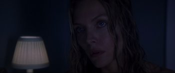 Movie still from “What Lies Beneath” (2000), directed by Robert Zemeckis – A person with blue eyes; Close Up shot, Low angle
