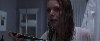 Movie still from “What Lies Beneath” (2000), directed by Robert Zemeckis – A person with wet hair; Close Up shot, Low angle