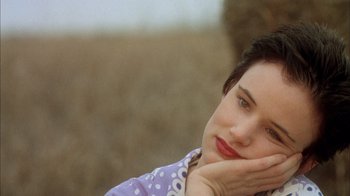 Movie still from “What's Eating Gilbert Grape” (1993), directed by Lasse Hallström – A person with her hand on her face; Close Up shot, High angle