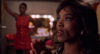 Movie still from “What's Love Got to Do with It” (1993), directed by Brian Gibson – Close Up shot, Over the shoulder angle