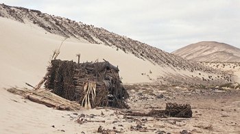 Movie still from “When Dinosaurs Ruled the Earth” (1970), directed by Val Guest – Extreme Wide shot, High angle