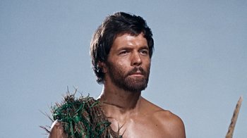 Movie still from “When Dinosaurs Ruled the Earth” (1970), directed by Val Guest – A person with a beard; Close Up shot, Low angle