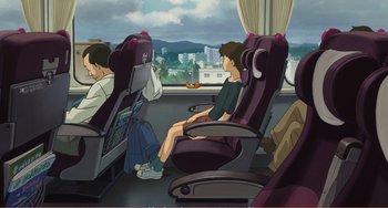 Movie still from “When Marnie Was There” (2014), directed by Hiromasa Yonebayashi – Two people are sitting on a train looking out the window; Wide shot, High angle