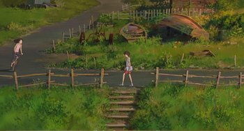 Movie still from “When Marnie Was There” (2014), directed by Hiromasa Yonebayashi – A girl is walking down a path in the woods; Extreme Wide shot, High angle