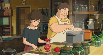 Movie still from “When Marnie Was There” (2014), directed by Hiromasa Yonebayashi – An illustration of a man and a woman cooking in a kitchen; Medium shot, High angle