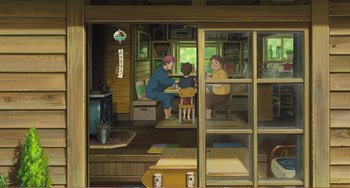 Movie still from “When Marnie Was There” (2014), directed by Hiromasa Yonebayashi – An illustration of a family sitting at a table; Wide shot, High angle
