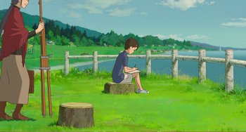 Movie still from “When Marnie Was There” (2014), directed by Hiromasa Yonebayashi – A person sitting on a tree stump in the grass; Wide shot, High angle