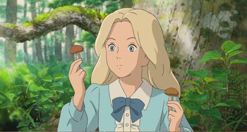 Movie still from “When Marnie Was There” (2014), directed by Hiromasa Yonebayashi – A woman holding two mushrooms in her hands; Close Up shot, High angle
