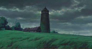Movie still from “When Marnie Was There” (2014), directed by Hiromasa Yonebayashi – A painting of a tower in the middle of a green field; Extreme Wide shot, Low angle