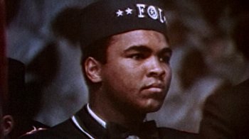 Movie still from “When We Were Kings” (1996), directed by Leon Gast – A person wearing a hat; Close Up shot, Low angle