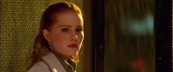 Movie still from “Where the Truth Lies” (2005), directed by Atom Egoyan – A person wearing a jacket; Close Up shot, Low angle
