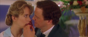 Movie still from “Where the Truth Lies” (2005), directed by Atom Egoyan – A man and a woman looking into each others eyes; Close Up shot, Over the shoulder angle
