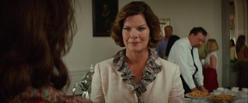 Movie still from “Whip It” (2009), directed by Drew Barrymore – A person wearing a dress; Close Up shot, Over the shoulder angle