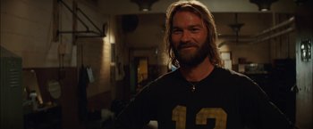 Movie still from “Whip It” (2009), directed by Drew Barrymore – A person with long blond hair; Close Up shot, Low angle