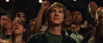 Movie still from “Whip It” (2009), directed by Drew Barrymore – A group of young men standing next to each other; Close Up shot, Low angle