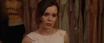 Movie still from “Whip It” (2009), directed by Drew Barrymore – A person wearing a dress; Close Up shot, Over the shoulder angle