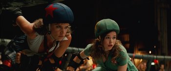 Movie still from “Whip It” (2009), directed by Drew Barrymore – A couple of people that are on a roller rink; Close Up shot, Low angle